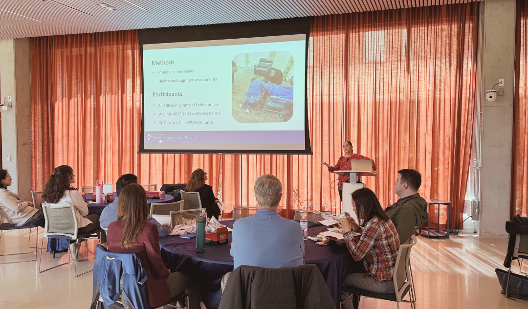 Audience listening to a presenter at the February 2026 Research Relay