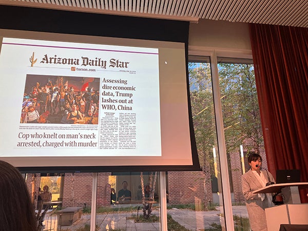 Photo of Michelle Torres, assistant professor of political science, presenting at the November 2022 Research Relays