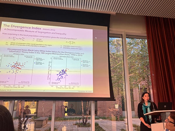 Photo of Elizabeth Roberto, assistant professor of sociology, presenting at the November 2022 Research Relays