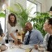 Employees around a table, Rice University Psychological Sciences